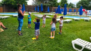 Young campers doing yoga