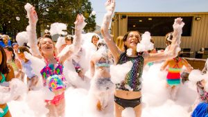 Campers jumping in bubbles