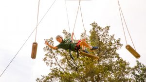 Camper doing the ropes course